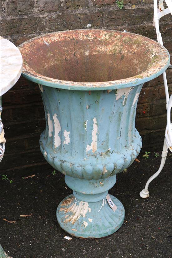 A Victorian painted cast iron campana shaped vase (outside)